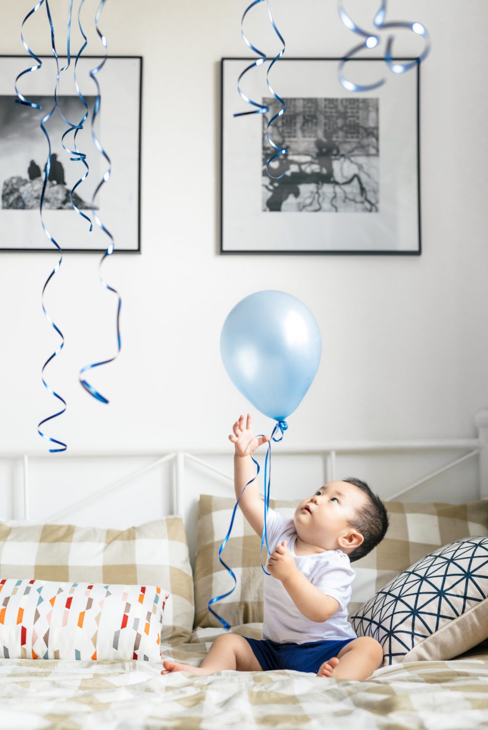 Toddler with birthday balloon